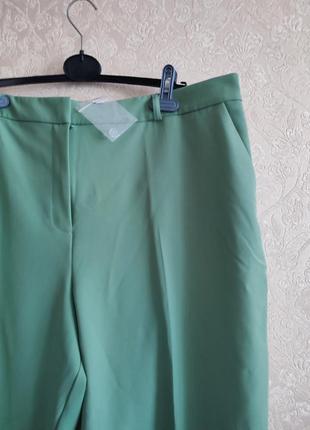 Продам новые женские штаны 22р4 фото