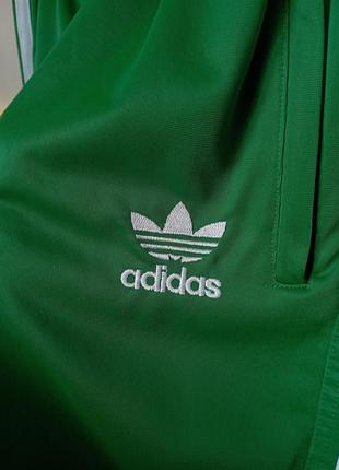 Зеленые повседневные спортивные штаны с лампасами на высокой посадке размер xxs-xs-s4 фото
