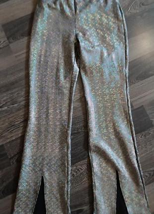 Новые брюки блестящие клеш с разрывами нарядные шейн1 фото