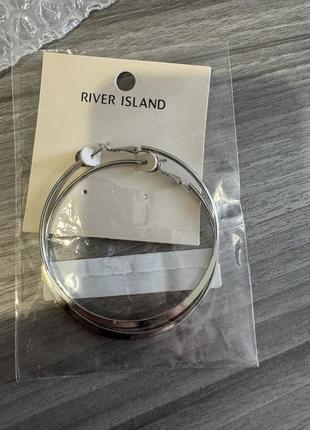 Нові сережки river island