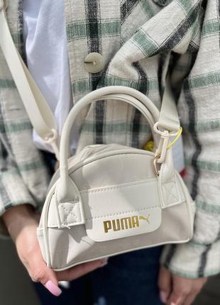 Сумка від бренду puma нова з біркою в бежевому кольорі1 фото