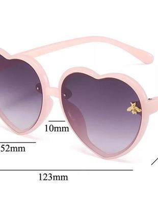 Стильні сонцезахисні рожеві дитячі окуляри серця2 фото