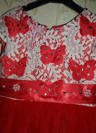 Нарядне плаття на дівчинку червоне 4-5л3 фото