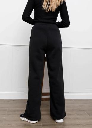 Чорні утеплені флісом широкі штани, розмір m3 фото