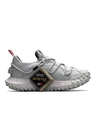 Чоловічі кросівки сірі nike acg mountain fly low gray