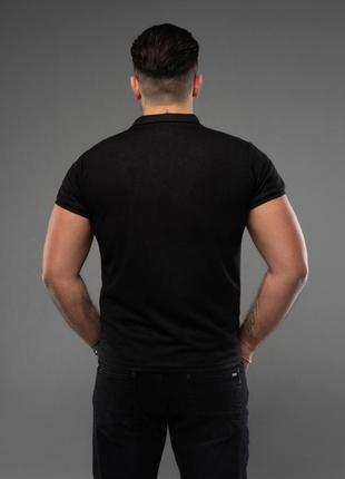 Чорна однотонна футболка поло, розмір m3 фото