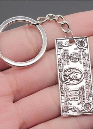Модний брелок долар $ у вигляді банкноти долара 100 доларів
