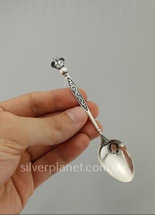 Срібна кавова ложка "амур на кулі"3 фото