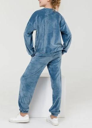 Блакитний велюровий костюм для дівчинки2 фото