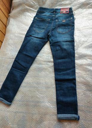 Новые джинсы4 фото