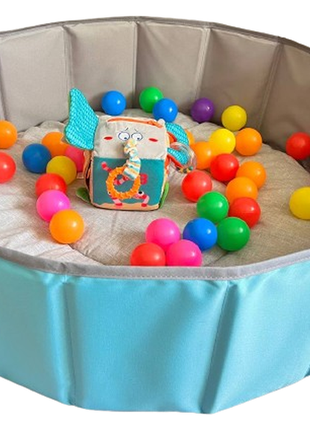 Сухой бассейн складной для новорожденного с ковриком уникубом и шариками 80х26 см голубой1 фото