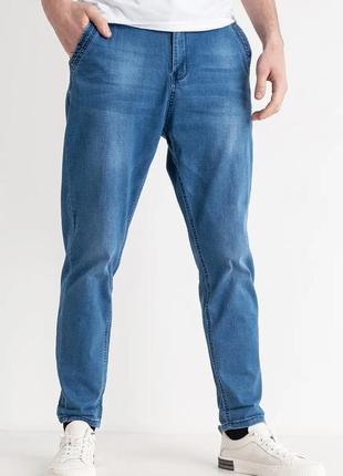 Стильні світлі чоловічі джинси мом блакитні чоловічі джинси на резинці світло сині чоловічі джинси потерті2 фото
