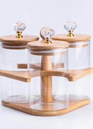 Банки для сипучих продуктів набір із 3 шт скляні на дерев'яній підставці1 фото