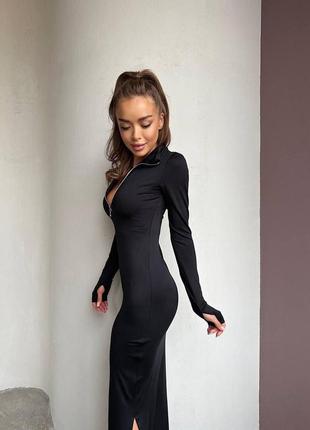 Женское черное платье еластичное на змейке с вырезом внизу2 фото