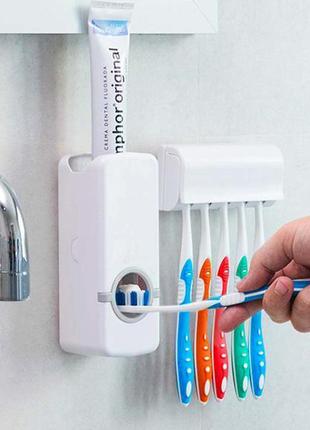 Дозатор зубної пасти і утримувач щіток toothpaste dispenser1 фото