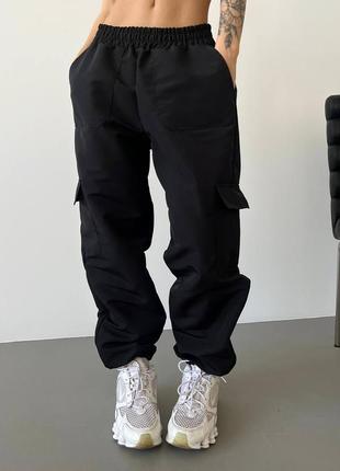 Спортивные штаны карго с резинкой в поясе с карманами с боковыми крупными накладными карманами низ на резинке3 фото