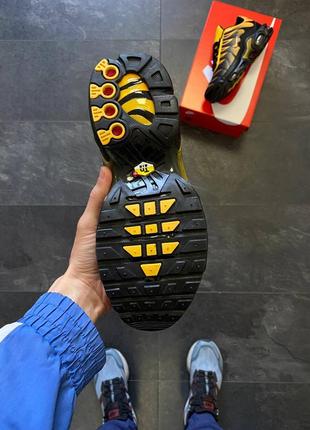 Мужские кроссовки черные с желтым nike air max plus tn sundial7 фото
