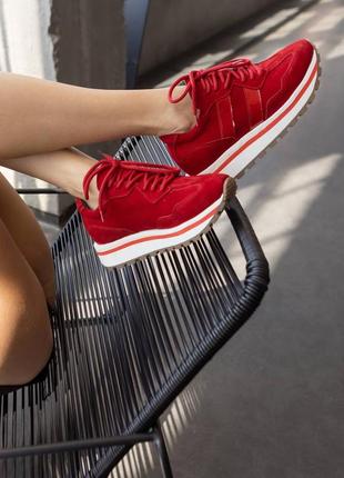 Кросівки червоного кольору на ева підошві10 фото