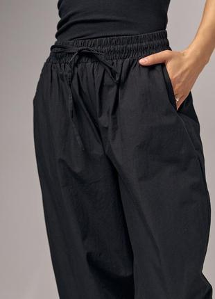 Женские брюки-бананы с карманами5 фото