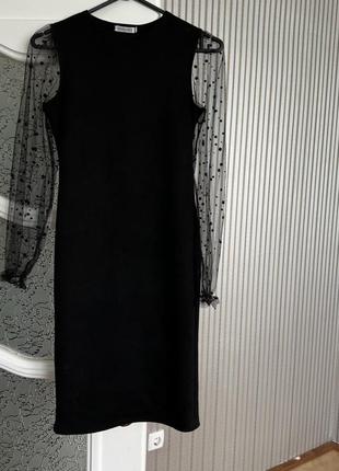 Чорна облягаюча сукня8 фото