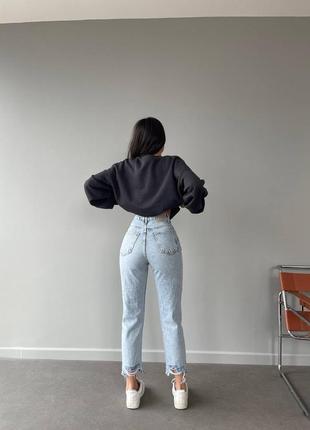 Рваные джинсы mom светло голубого цвета2 фото