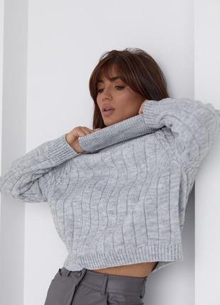 Жіночий вʼязаний светр2 фото