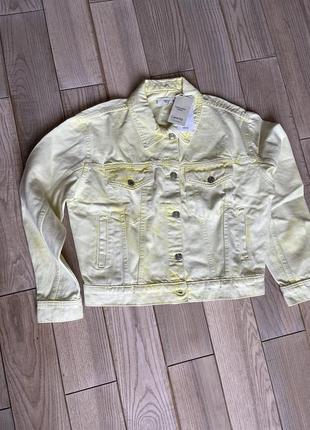 Жіноча джинсова куртка