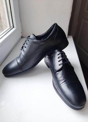Нові чоловічі туфлі