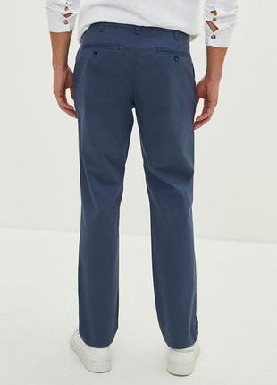 Классические брюки темно синего цвета3 фото