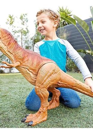 Гігантський динозавр ті-рекс парк юрського періоду super colos...