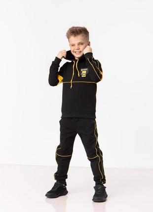 Спортивний костюм на хлопчика від 5 років колір чорний з жовти...