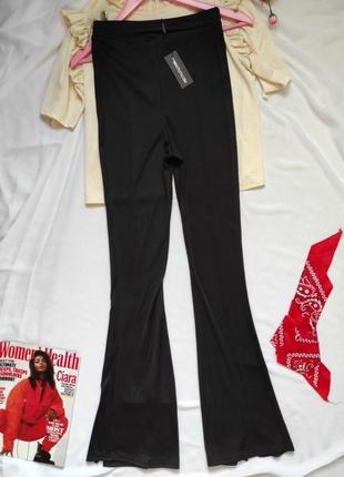 Чорные лосины штаны по фигуре снизу кльош с разрезом брюки женские в обтяжку3 фото