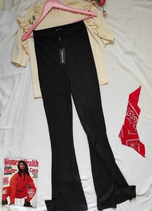 Чорные лосины штаны по фигуре снизу кльош с разрезом брюки женские в обтяжку2 фото