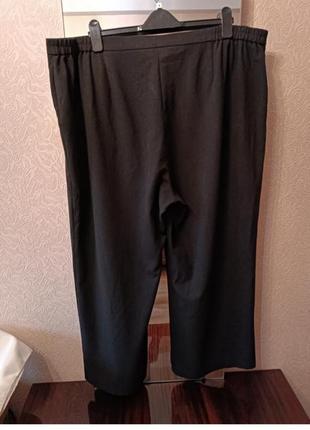Черные брюки большого размера.6 фото