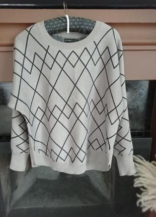 Продам шикарний та стильний светр, р.52-54.1 фото