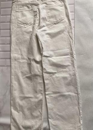 Новые белые джинсы