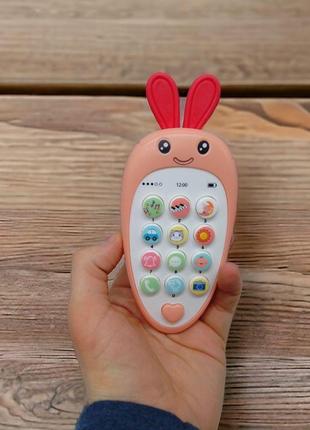 Развивающая игрушка "морковка-телефон" (розовая)2 фото
