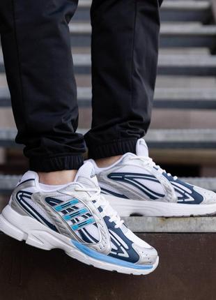 Чоловічі кросівки адідас adidas responce silver white blue7 фото