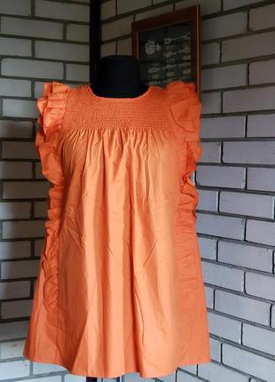 Плаття з рюшами помаранчевого кольору 10-12 р-ру.