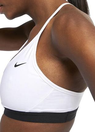 Новый спортивный топ бра nike dri-fit indy women's sports bra white4 фото