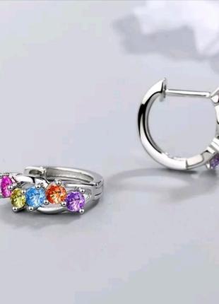 Сережки кольца с разноцветными камнями2 фото