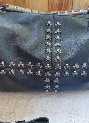 Шкіряна сумка з черепками