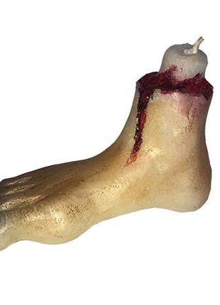 Свечка оторванная ступня.