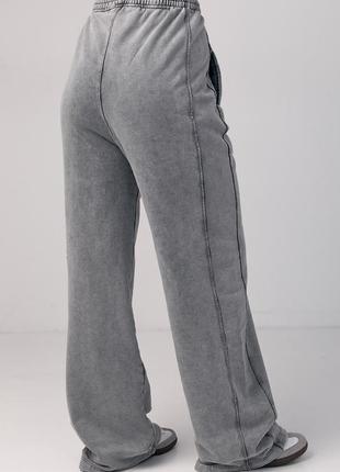 Женские трикотажные брюки с затяжками внизу2 фото