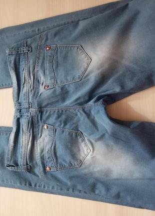Літні блакитні джинси cudi на худеньку довгоногу дівчину3 фото