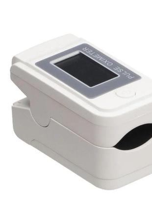 Пульсоксиметр fingertip lk-89 на палець портативний вимірювач кисню в крові білий1 фото