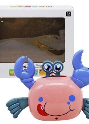 Уценка. музыкальная игрушка "танцующий краб", розовый не работает електроника