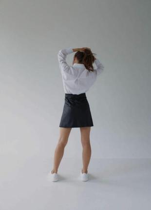 Юбка мини экокожа romashka юбка трапеция с разрезом3 фото