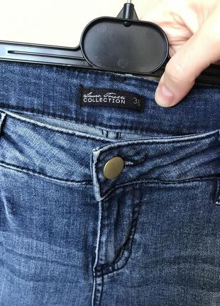 Фирменные стрейч джинсы с рваностями средняя посадка4 фото