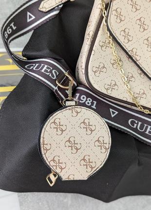 Сумка женская   guess  молочная гесс кросс-боди 2 в 13 фото